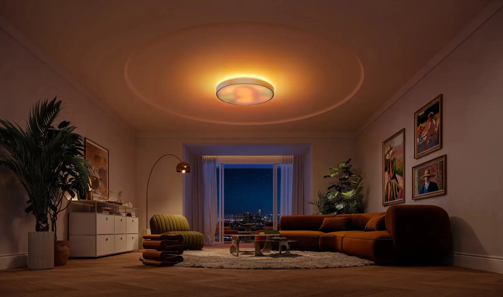 Govee Ceiling Light Ultra mounted above a living room, showing a warm patterned face and a yellow ceiling halo