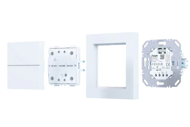Official Hager Vertriebsgesellschaft press image showing the four-button WAC1020 module, white cover and frame, and a compatible flush-mounted insert