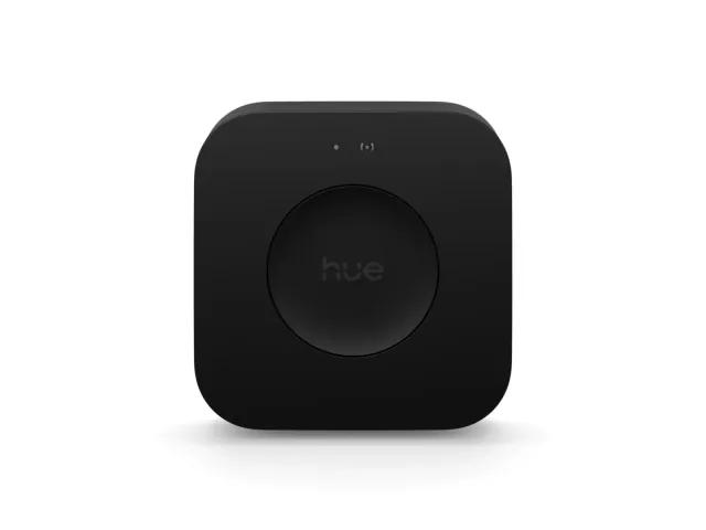 Black Philips Hue Bridge Pro with a round central Hue button