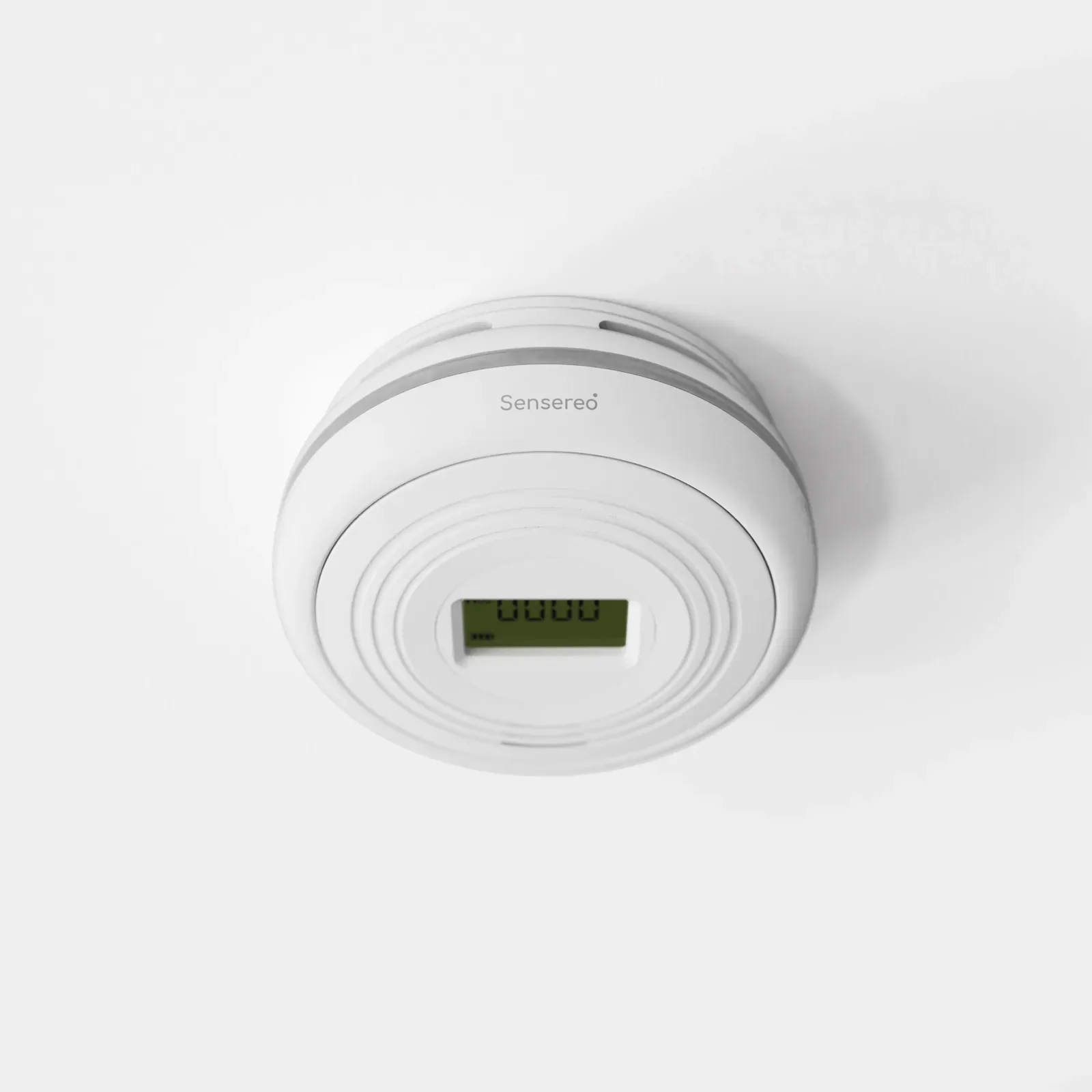 White Sensereo MSC-1 smoke and carbon monoxide alarm with a central LCD