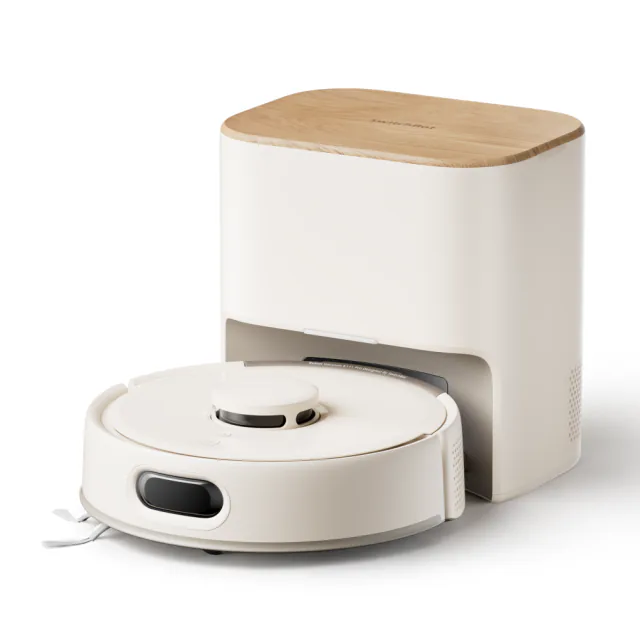 White SwitchBot K11+ Pro robot vacuum in front of its compact self-emptying station