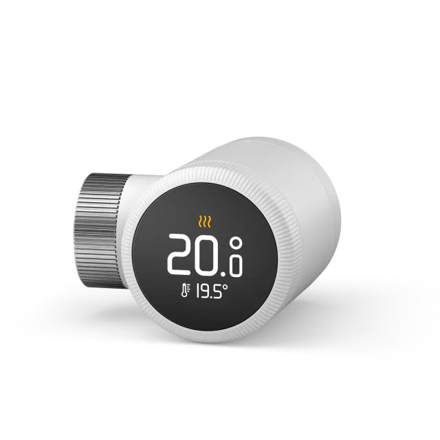Tado Smart Radiator Thermostat X VA04 with a round temperature display and metal mounting nut
