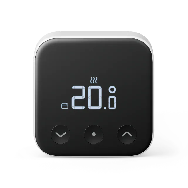 First-generation Tado RU04 wired thermostat with a black face and three physical buttons