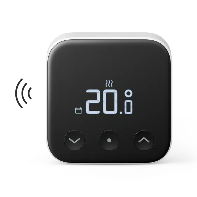 First-generation Tado SU04 wireless room sensor with a black display and three temperature-control buttons