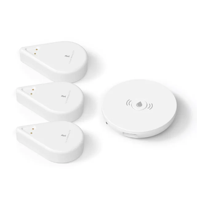 White ThirdReality KM1 controller beside three teardrop-shaped water leak sensors