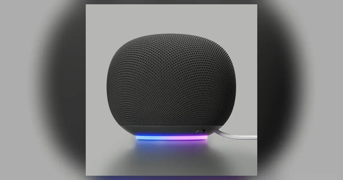 Google Home Speaker in Hazel with its status light glowing