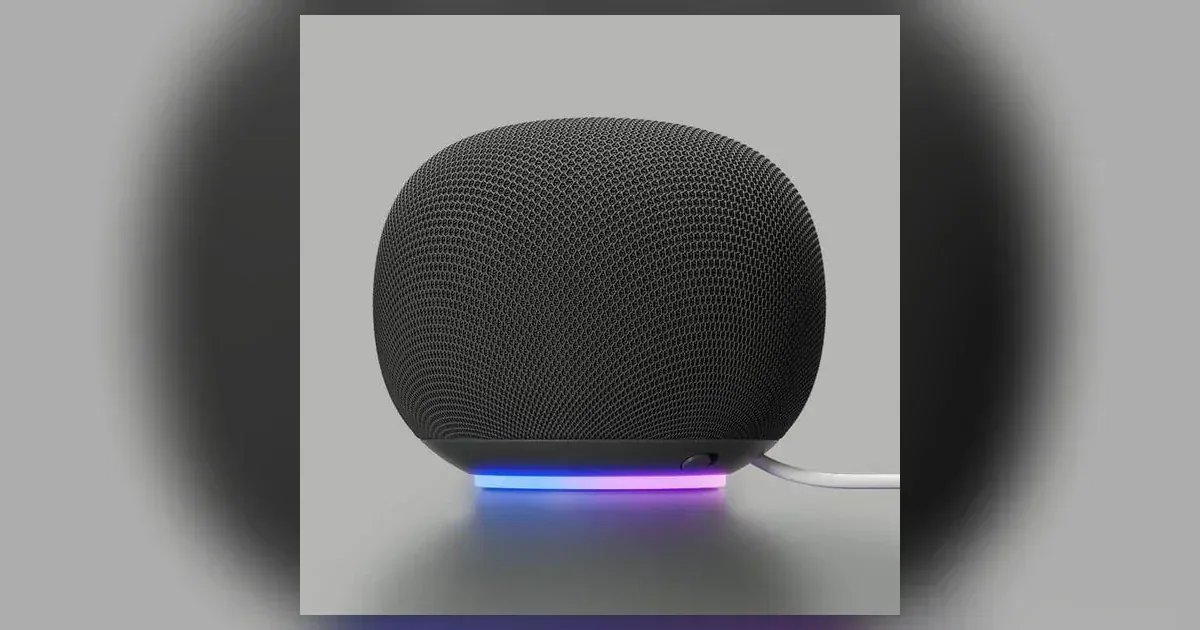 Google Home Speaker in Hazel with its status light glowing